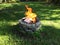 Stone fire pit used for burning household trash