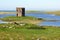 Stone folly on island in lake