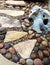 Stone footpath through pebble gravel in rock garden