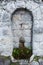 Stone fountain in Cadore, in Dolomiti region, noth Italy