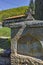 Stone fountain and church in Temski monastery St. George, Republic of Serbia