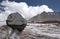 Stone on the glacier moraine in Caucasus mountains