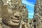 Stone head on towers of Bayon temple