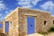 Stone house masonry blue sky door windows