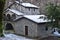 Stone house with a roof covered with frost along the trada that leads to the lake of Isola Santa, magic in the heart of the Apuan