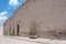 stone house on a street in the center of the town of La PeÃ±a del Bernal in Queretaro