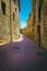 Stone houses and arranged paved pedestrian street in San Gimignano