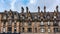 Stone houses with the typical architecture of the monumental city of Edinburgh, Scotland.