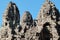 Stone human faces featured on the towers of Cambodia\\\'s Khmer Bayon Temple