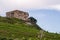 Stone hut on hillside, Sicily, Italy