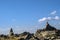 Stone idol on a mountain plateau