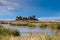 Stone Island, view through the reeds, near floating Uros islands on lake Titicaca in Peru, South America.