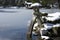 Stone Lantern along frozen Kasumigaike pond in Kenrokuen, one of the most beautiful garden in