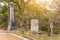 Stone lantern, plum trees and death poem stele in the Japanese Dazaifu shinto shrine dedicated to Sugawara no Michizane.