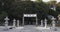 A stone lanterns at Meguro fudo temple in Tokyo wide shot