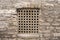 Stone lattice window wall of an ancient building