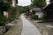 Stone lined street with traditional Japanese buildings. Magome, Japan