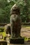 Stone lion guards entrance to Ta Prohm