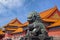 A stone lion placed in front of the internal gates of the Palace Museum Forbidden City in Beijing, China.