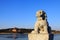 Stone lion sculptures in seventeen holes bridge railing