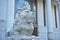 Stone lion standing in front of a Chinese bank