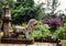 Stone lion statue in a green garden