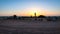 Stone menhirs at Cromeleque do Xerez in Portugal at sunrise