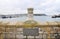 Stone monument of a crown in 1962, Plymouth, UK