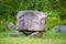 Stone parallelepiped on an improvised pedestal