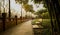 Stone path along balustraded riverside in city at twilight