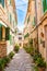 Stone paved narrow street, in Valdemossa medieval village, Mallorca, Balearic Islands, Spain