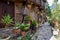 The stone paved street of the old Kakopetria surrounded by flowers. Nicosia District. Cyprus