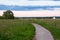 The stone-paved trail through the Bogolubovo meadow towards Church of the Intercession of the Holy Virgin on the Nerl River.