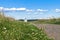 The stone-paved trail through the Bogolubovo meadow towards Church of the Intercession of the Holy Virgin on the Nerl River.