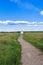 The stone-paved trail through the Bogolubovo meadow towards Church of the Intercession of the Holy Virgin on the Nerl River.