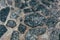 Stone pavement texture, cobbled stone road top view, vintage background
