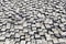 Stone pavement texture. Granite cobble stoned pavement background. Abstract background of old cobblestone pavement close-up 2