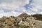 Stone piles and Glamaig in the red Cuillin on Skye.