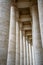 Stone pillar walkway surrounding the Vatican building