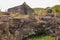 A stone platform in front of the white sandy beach of Anakena. Easter Island, Chile