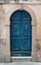 Stone portal and a wooden door