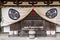 Stone pot with incense sticks and row of votive offerings in the Chion-in Kyoto temple, Japan