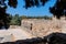 Stone powerful walls of old city, the ancient defense of Old Town, Rhodes, Dodecanese, Greece.