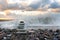 Stone pyramid of pebble against the background of the blue sea on Pebl-Bich, for Spa, meditation