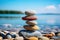 Stone pyramid. Pebbles balance pile, harmony zen stones, balance stack, sea pebble pyramid on shoreline, relaxation