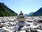 Stone pyramids, little man, mound, ovoo, Inukshuk in the blue sky