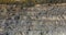 Stone quarry panorama, panorama of a large stone quarry, roads in the quarry. Large open-pit iron ore mine