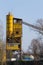 Stone quarry with yellow silo