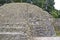 Stone relief at Maya archaeological site Caracol in Belize