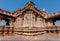 Stone reliefs on walls of the Hindu temple in India. Architecture of 7th century with carved walls in Pattadakal